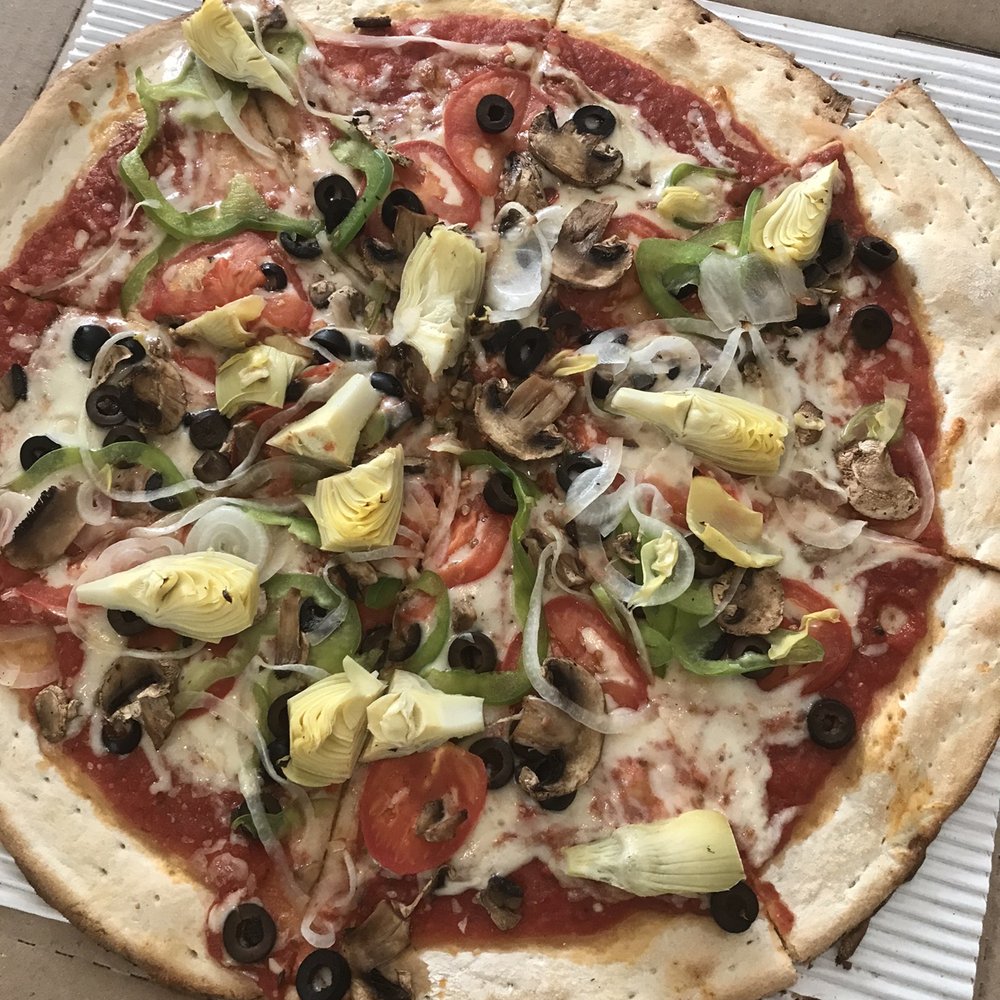 Skimpy cheese. 2 inches of crust. Skimpy cheese. 2 inches of crust.