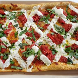 Nonna's Pan Pizza made w Crushed tomatoes, fresh mozzarella, basil, oregano, grated pecorino & olive oil