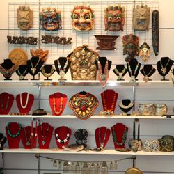 OM YOGI - Buddhist Protector Masks & Traditional Tibetan Necklaces with Coral & Torquoise.
