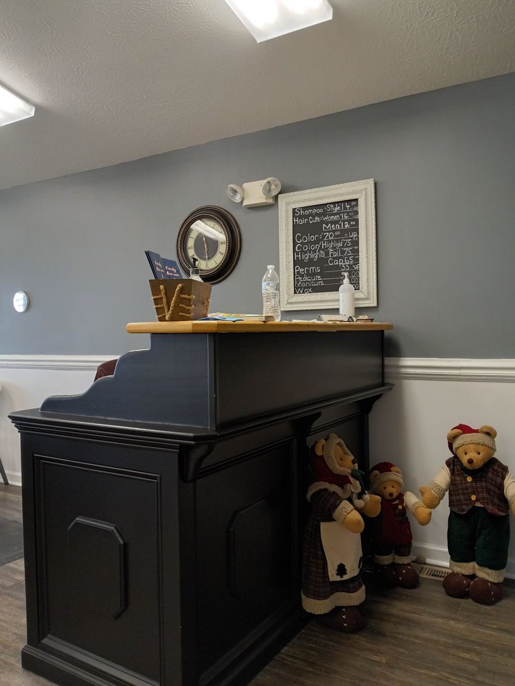 Family Hair Care & Nail Spa Logo