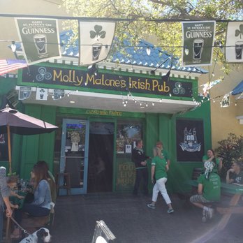 Molly Malone's Irish Pub - Outside entrance has been redone in green at Molly Molone's Irish Pub, Davis Island, South Tampa - Irish Near Me - Tampa, Florida