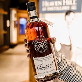 Heaven Hill Distilleries - a hand holding a bottle of bourbon - Distilleries Near Me - Bardstown, Kentucky Heaven Hill Distilleries - a hand holding a bottle of bourbon - Distilleries Near Me - Bardstown, Kentucky