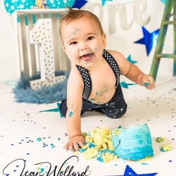Jean Wolford Photography - Cake smash blue star themed session taken by Jean Wilford Photography in studio in Star, Idaho.