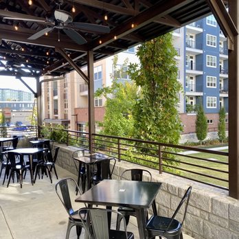 La Chiquiada - Another angle of the wraparound, covered patio and landscaping - Mexican Near Me - Decatur, Georgia