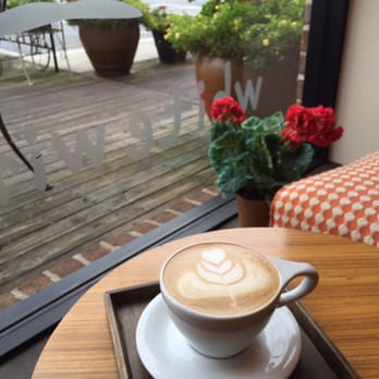 White Windmill - Caffe latte. Cute interior design and patio area - Bakeries Near Me - Doraville, Georgia