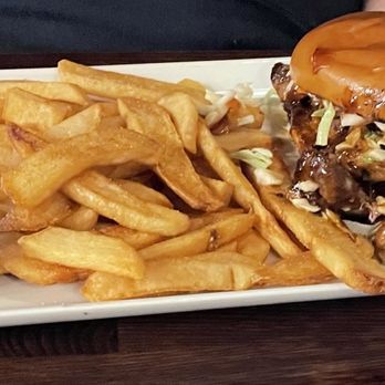 The Iron Cactus - Pulled pork sandwich with a generous portion of steak fries! Delicious!!! - Cocktail Bars Near Me - Lancaster, California The Iron Cactus - Pulled pork sandwich with a generous portion of steak fries! Delicious!!! - Cocktail Bars Near Me - Lancaster, California