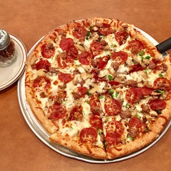 Olympic Steak & Pizza - Oakland - a pizza with pepperoni and sausage - Steakhouses Near Me - Oakland, Tennessee Olympic Steak & Pizza - Oakland - a pizza with pepperoni and sausage - Steakhouses Near Me - Oakland, Tennessee