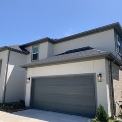 Steve’s Gutters - Two story seamless gutter in gray
