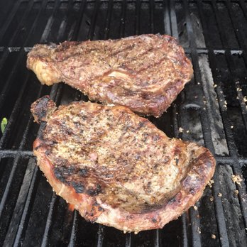 Off The Tracks Cafe - two steaks cooking on a grill - Cafes Near Me - Dana, Indiana
