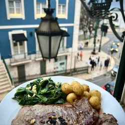 Excuizine Caterer - Angus strip steak, sautéed greens and duck fat fried Iberian potatoes
