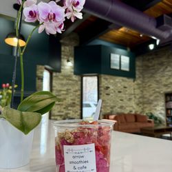 Arrow Smoothies & Cafe - The Dragon! dragon fruit bowl with an overload of honey almond granola and strawberries