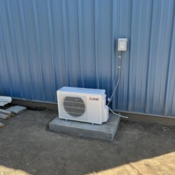 Sky Whirl Inc. Heating & Air Conditioning - Outdoor condenser/heat pump unit.