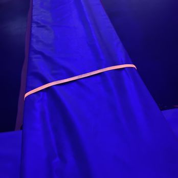 Sky Zone Trampoline Park - Loose tie down straps on loose padding between trampoline squares. *Safety Hazard* - Trampoline Parks Near Me - Covina, California Sky Zone Trampoline Park - Loose tie down straps on loose padding between trampoline squares. *Safety Hazard* - Trampoline Parks Near Me - Covina, California