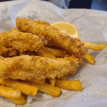 Flying Tomato - Fish and chips. This was light and crispy, very flaky fish. Fries were definitely hand cut and tasty. - Diners Near Me - Spanaway, Washington