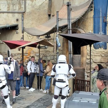 Savi's Workshop - Handbuilt Lightsabers - First Order Stormtroopers questioning guests around Savi's Workshop - Toy Stores Near Me - Anaheim, California Savi's Workshop - Handbuilt Lightsabers - First Order Stormtroopers questioning guests around Savi's Workshop - Toy Stores Near Me - Anaheim, California