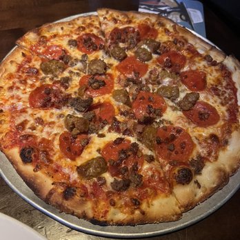 Yard House - The Carnivore Pizza. I love pizza but this was unacceptable. - New American Near Me - San Antonio, Texas Yard House - The Carnivore Pizza. I love pizza but this was unacceptable. - New American Near Me - San Antonio, Texas