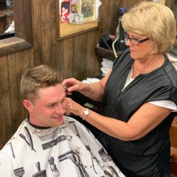 A 1 to 4 fade with a scissor cut on top! Thanks, Gina!