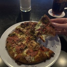 Personal Build Your Own Pizza Pesto base with pepperoni, red onion and jalapeño Personal Build Your Own Pizza Pesto base with pepperoni, red onion and jalapeño