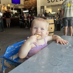 Daughter eating pizza Daughter eating pizza