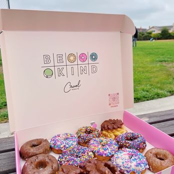 Cruel Donuts - a box of donuts on a park bench - Donuts Near Me - San Mateo, California Cruel Donuts - a box of donuts on a park bench - Donuts Near Me - San Mateo, California