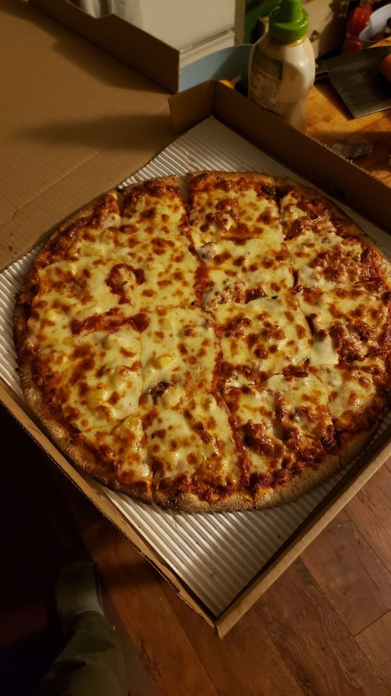 Ninos Pizza & Subs Logo