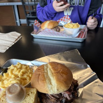 J & L BBQ - Brisket sandwich in front, pulled pork in back. Mac and cheese. Cornbread with cinnamon butter. - Barbeque Near Me - Snohomish, Washington