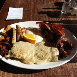The works--and isn't it laid out prettily, with two flanks of home fries. The works--and isn't it laid out prettily, with two flanks of home fries.