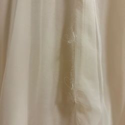Evergreen Cleaners - Major rip along the dress seem