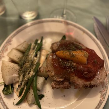 LaBinnah Bistro - African Peri Peri Pork Chop - Mediterranean Near Me - Hannibal, Missouri