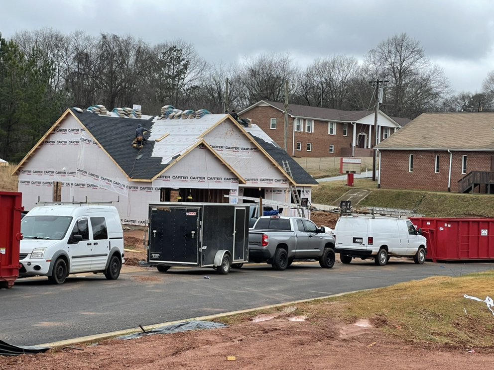 Slide of RC Roofing Contractor