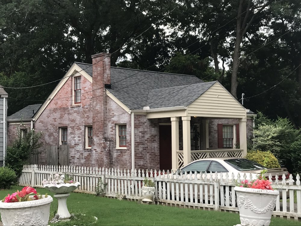 Slide of Rosie's Roofing and Restoration