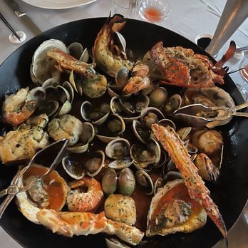 Maple & Ash - Fire Fire-Roasted Seafood Tower - Steakhouses Near Me - Chicago, Illinois Maple & Ash - Fire Fire-Roasted Seafood Tower - Steakhouses Near Me - Chicago, Illinois