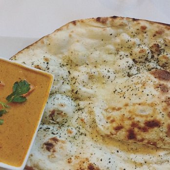 Cholanad - Chicken masala with garlic naan - Indian Near Me - Chapel Hill, North Carolina Cholanad - Chicken masala with garlic naan - Indian Near Me - Chapel Hill, North Carolina