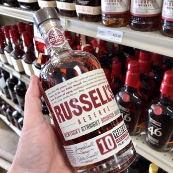 Virginia ABC Store - a hand holding a bottle of russell - Beer, Wine & Spirits Near Me - Virginia Beach, Virginia Virginia ABC Store - a hand holding a bottle of russell - Beer, Wine & Spirits Near Me - Virginia Beach, Virginia