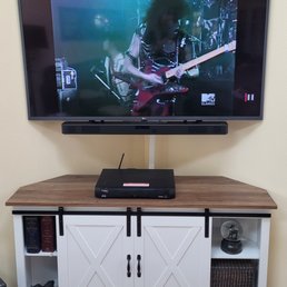 Corner mounted 55 inch LG TV and Soundbar Corner mounted 55 inch LG TV and Soundbar