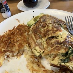 Dry Burnet omelet with over seasoned overdone hash browns. Dry Burnet omelet with over seasoned overdone hash browns.