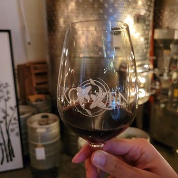 Koi Zen Cellars - a hand holding a wine glass - Venues & Event Spaces Near Me - San Diego, California Koi Zen Cellars - a hand holding a wine glass - Venues & Event Spaces Near Me - San Diego, California