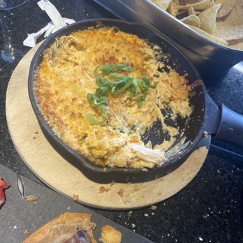 Topgolf - Buffalo chicken dip and chips - Sports Bars Near Me - Renton, Washington Topgolf - Buffalo chicken dip and chips - Sports Bars Near Me - Renton, Washington