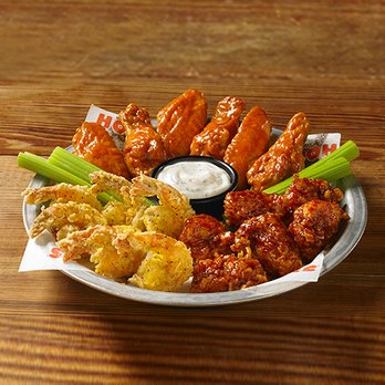 Hooters - a plate of chicken wings with ranch dip - Sports Bars Near Me - Prattville, Alabama