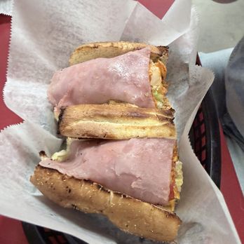 Slicers Hoagies - 8-inch turkey and ham toasted with voodoo chips! - Sandwiches Near Me - Naples, Florida Slicers Hoagies - 8-inch turkey and ham toasted with voodoo chips! - Sandwiches Near Me - Naples, Florida