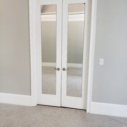Noble Custom Glass & Mirror - Custom fit mirror added to bathroom doors