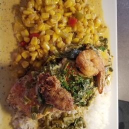 Blackened salmon fried corn rice topped with one oyster and shrimp sauce waffles grits eggs and chicken sausage. Blackened salmon fried corn rice topped with one oyster and shrimp sauce waffles grits eggs and chicken sausage.