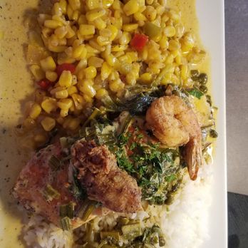 Virgil's Gullah Kitchen & Bar - Blackened salmon fried corn rice topped with one oyster and shrimp sauce waffles grits eggs and chicken sausage. - Breakfast & Brunch Near Me - Conyers, Georgia Virgil's Gullah Kitchen & Bar - Blackened salmon fried corn rice topped with one oyster and shrimp sauce waffles grits eggs and chicken sausage. - Breakfast & Brunch Near Me - Conyers, Georgia