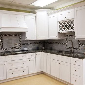 Chicago Kitchen Outlet - a kitchen with white cabinets - Flooring Near Me - Villa Park, Illinois