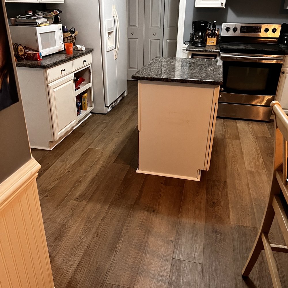 Crown Flooring LLC - a kitchen with hardwood floors - Flooring Near Me - Raleigh, North Carolina