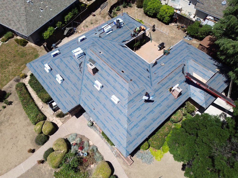 Slide of Conrad Roofing Service