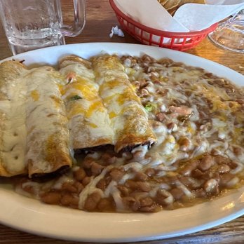 Mexico Restaurant - Rolled tacos and beans. Delicious - Mexican Near Me - Honolulu, Hawaii