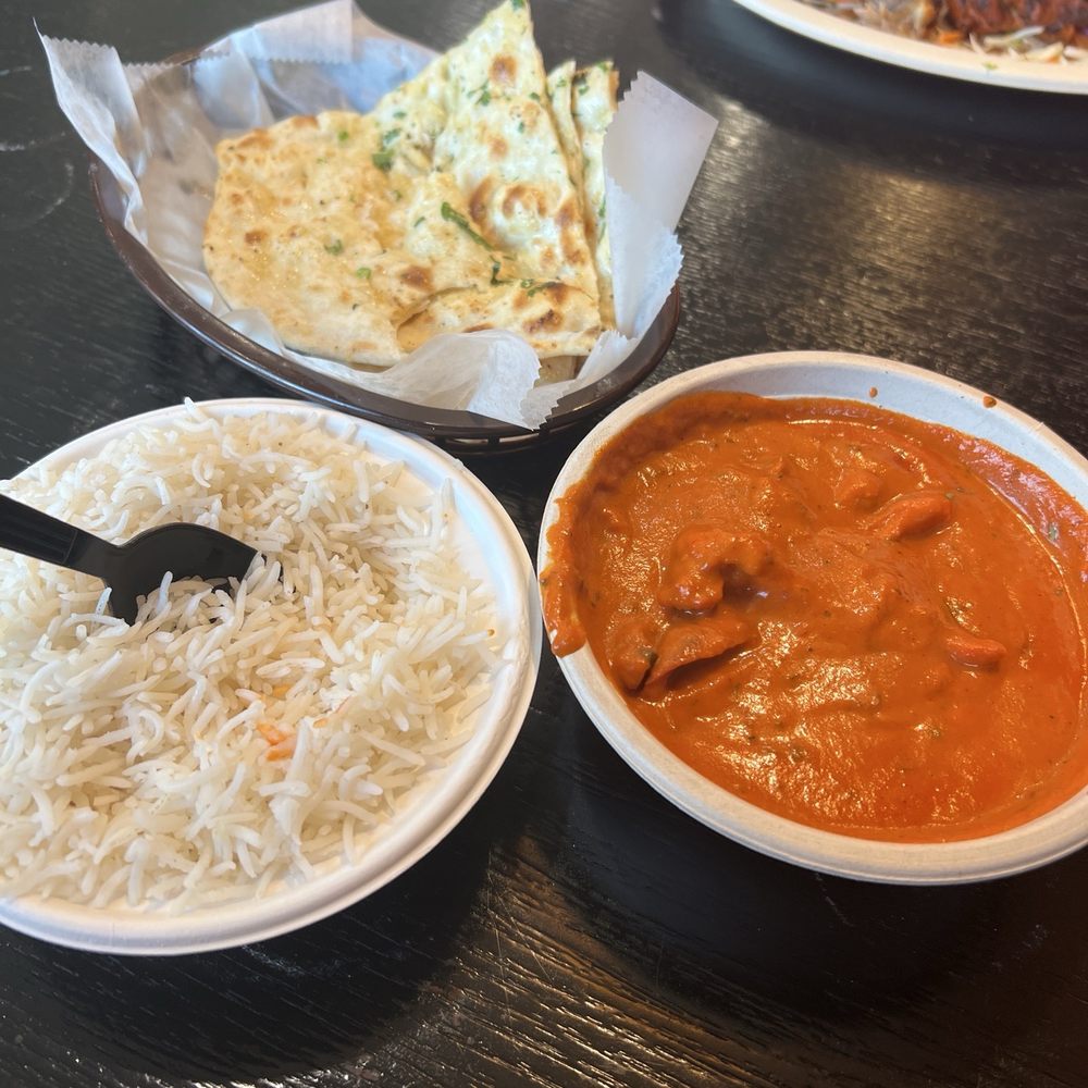 Butter chicken, Garlic Naan and Tandoori chicken Butter chicken, Garlic Naan and Tandoori chicken