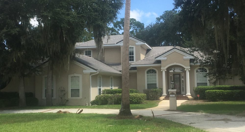 Slide of J Adams Roofing