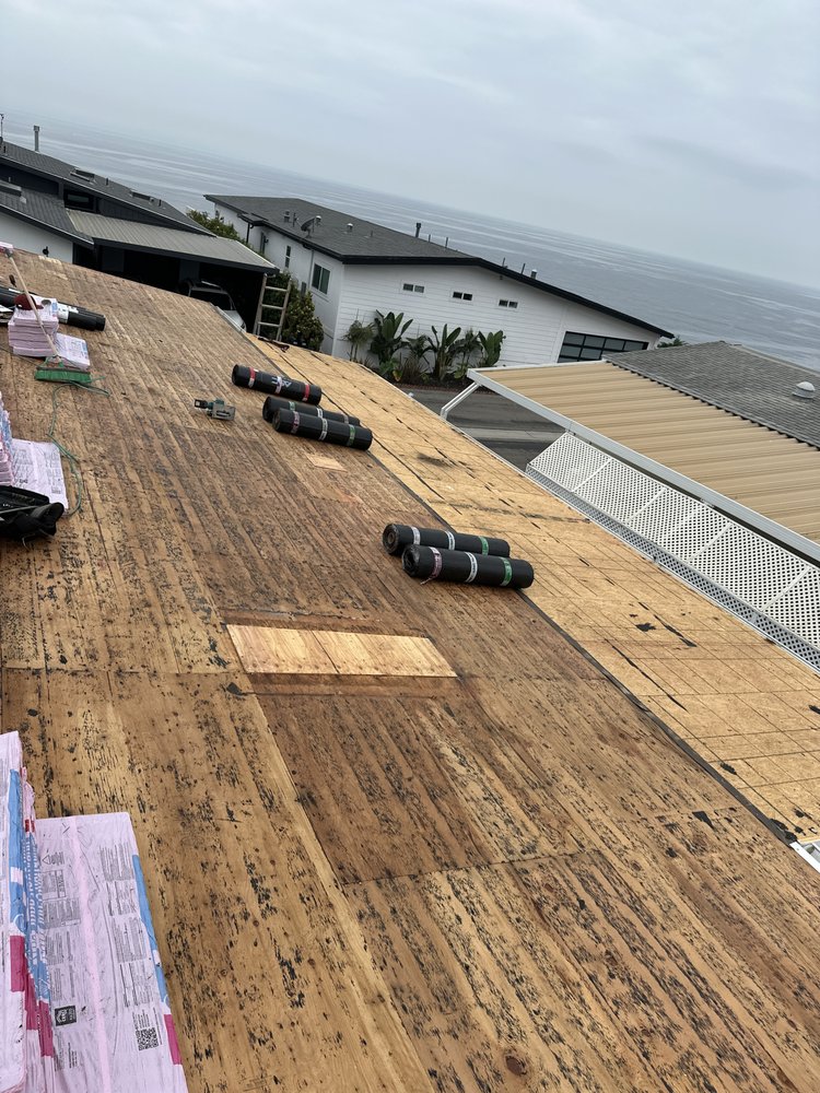 Slide of T’S Roofing